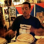 photo of John Santos drumming