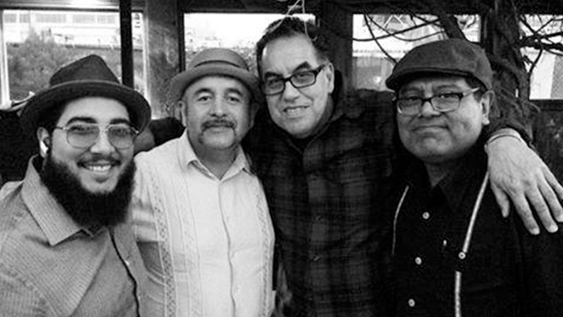 Black and white photo of Los Compas