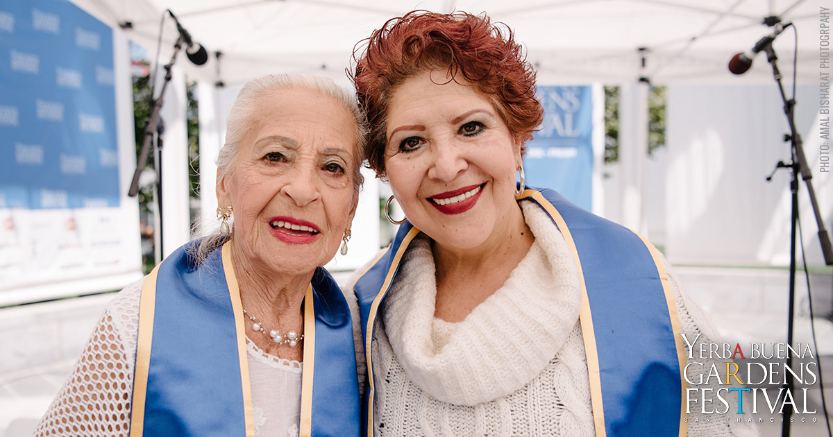 Photo of two members of Community Music Center Older Adult Choirs by Amal Bisharat Photography